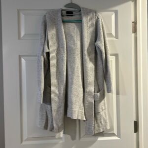 Beautiful sweater to eat over any top going out heading to work